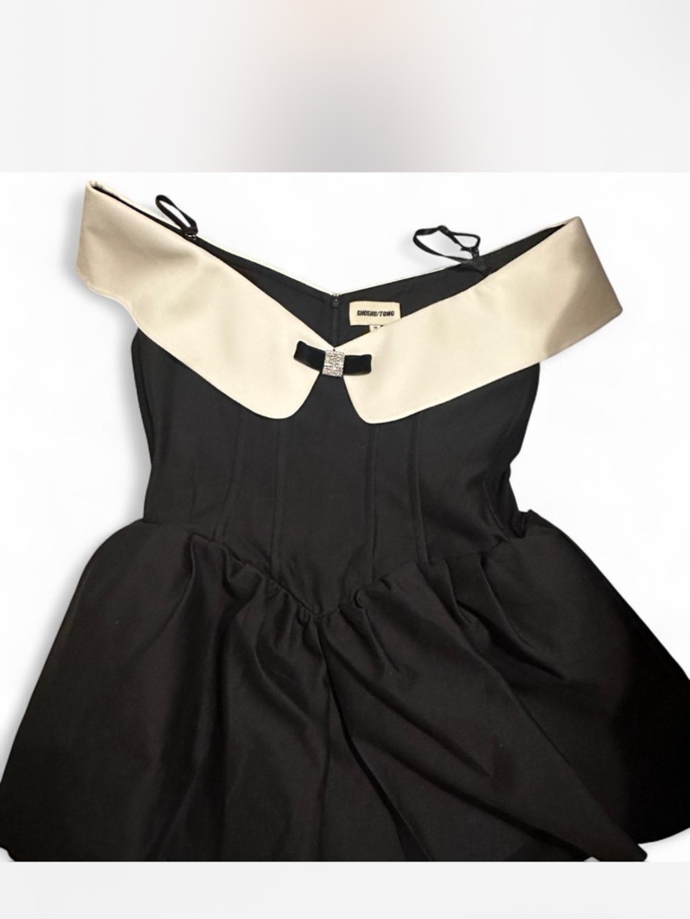 Off-Shoulder Black & White Mini Dress with Bow Detail - Picture 2 of 3